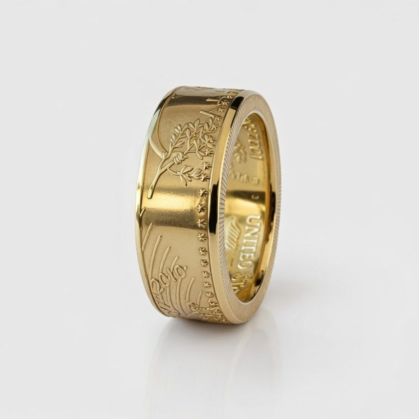 Half ounce American Gold Eagle coin ring standing on edge with the date and hand holding an olive branch showing.