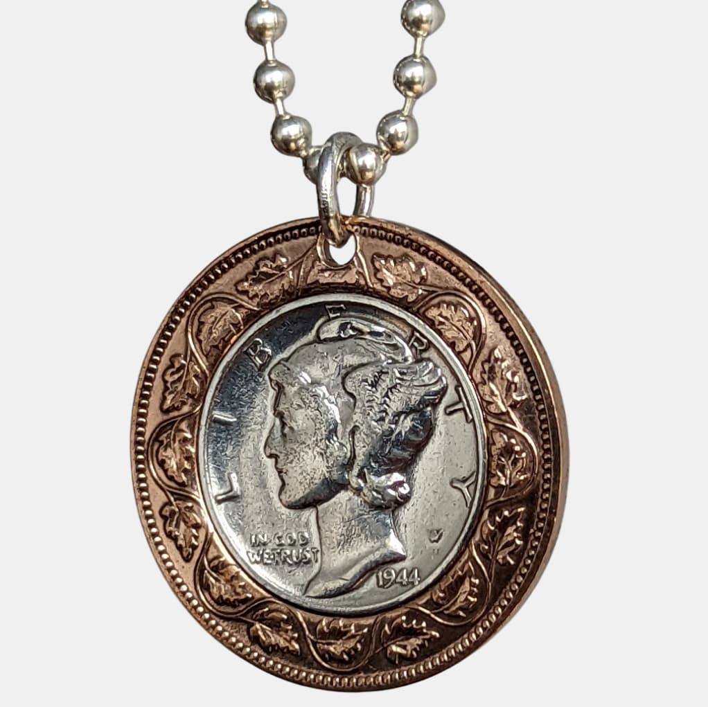 Bullseye pendant on a sterling ball chain on a white background at 3/4 angle