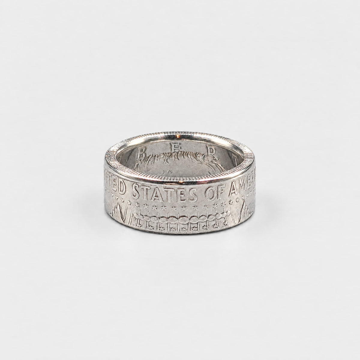 JFK half dollar coin ring with a polished finish from Silver State Foundry