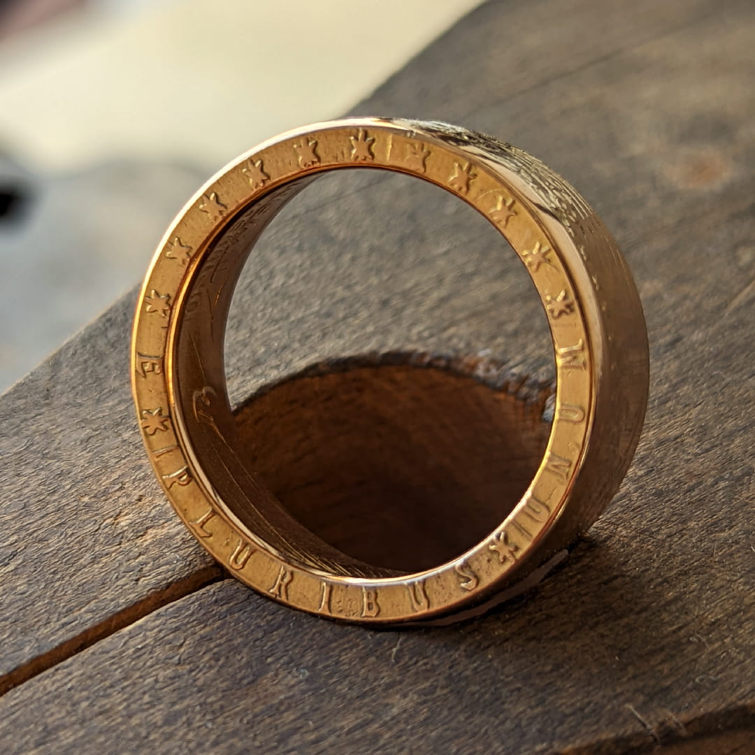 Pre-1933 Saint Gaudens Gold Eagle coin ring displaying the distinctive edge stamp (E PLURIBUS UNUM + 13 stars)