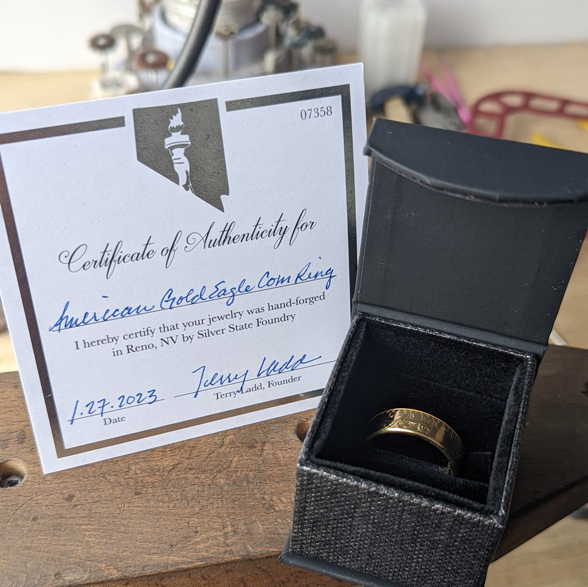 Silver State Foundry Certificate of Authenticity and gold ring in a ring box