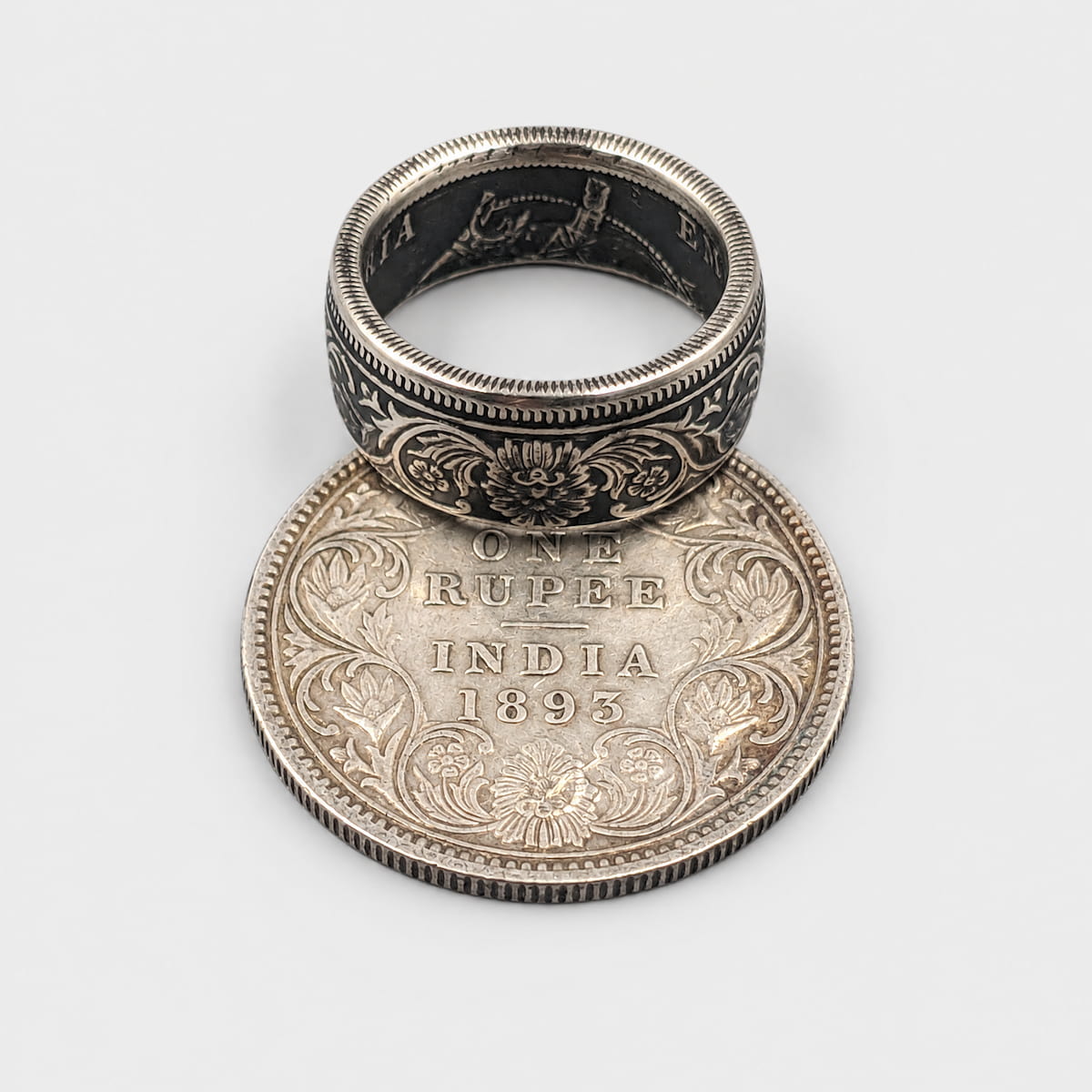 Indian 1 rupee silver coin ring with an original coin and a patina finish from Silver State Foundry