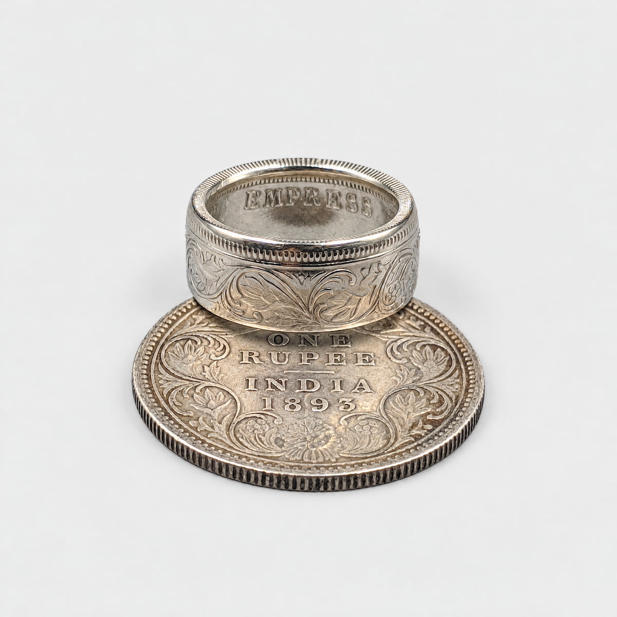 Indian 1 rupee silver coin ring with an original coin with a polished finish from Silver State Foundry