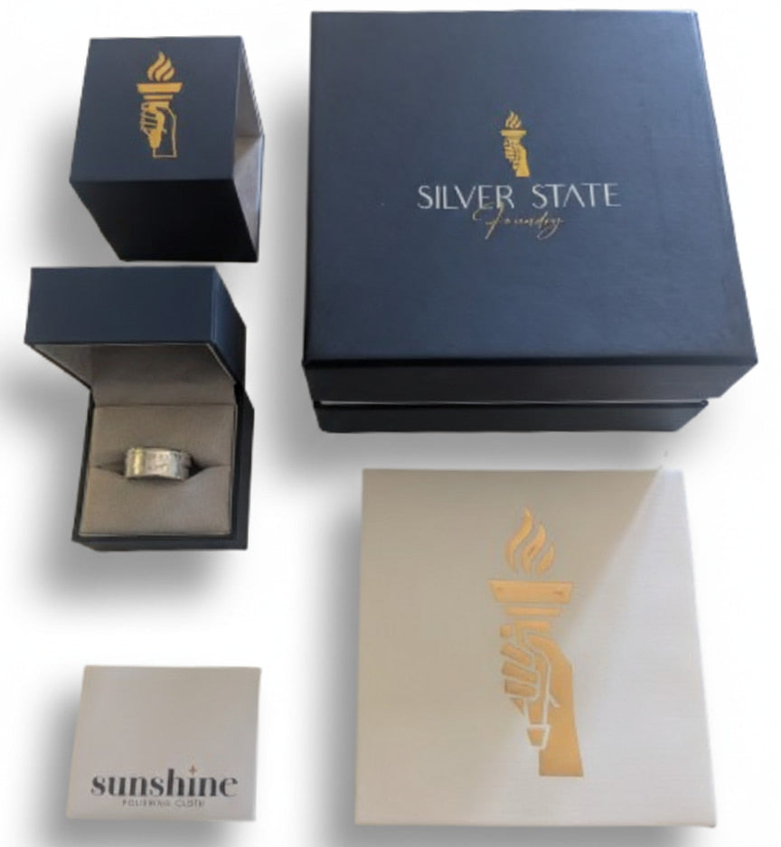 Silver State Foundry packaging image - ring in ring box, certificate of authenticity, polishing cloth