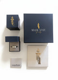 Silver State Jewelry packaging with a ring and 'sunshine' card on a white background