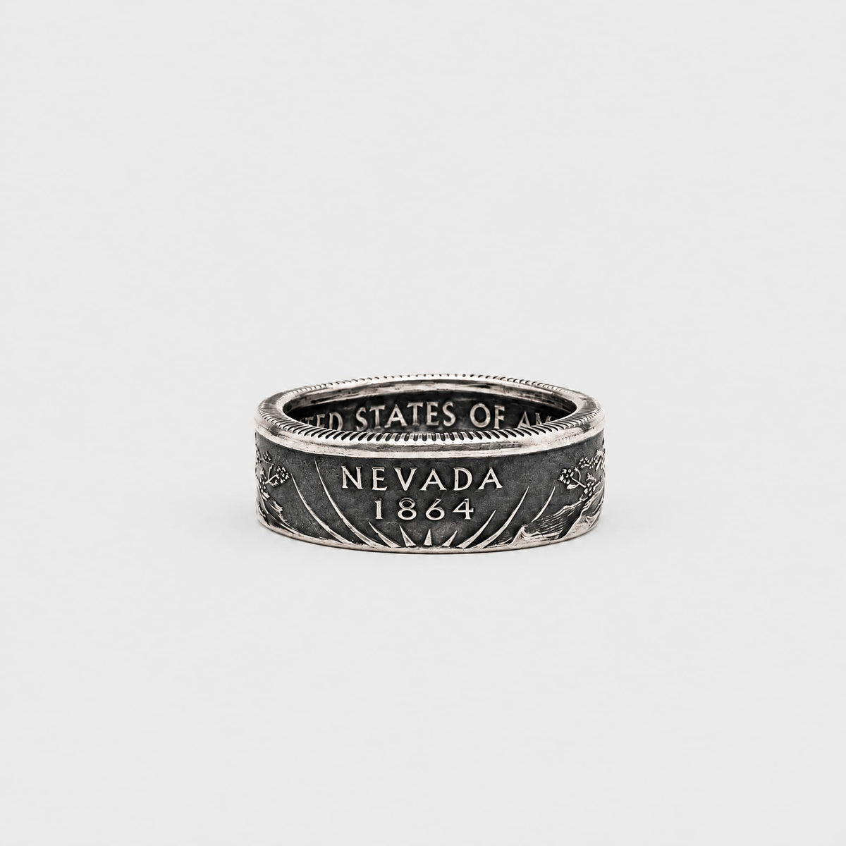 Silver Statehood quarter coin ring with a patina finish from Silver State Foundry