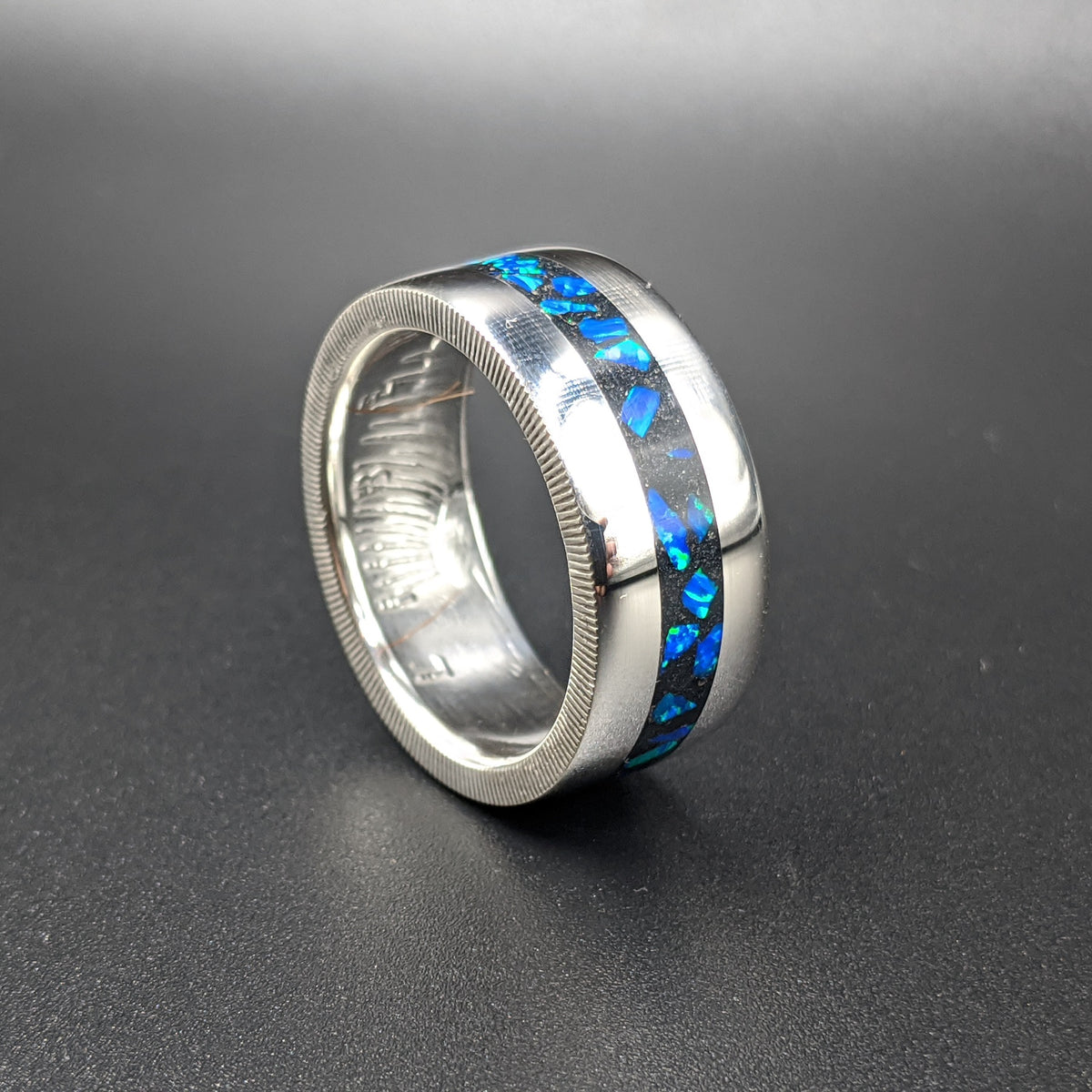 cremation jewelry as a coin ring with azure blue opal inlay