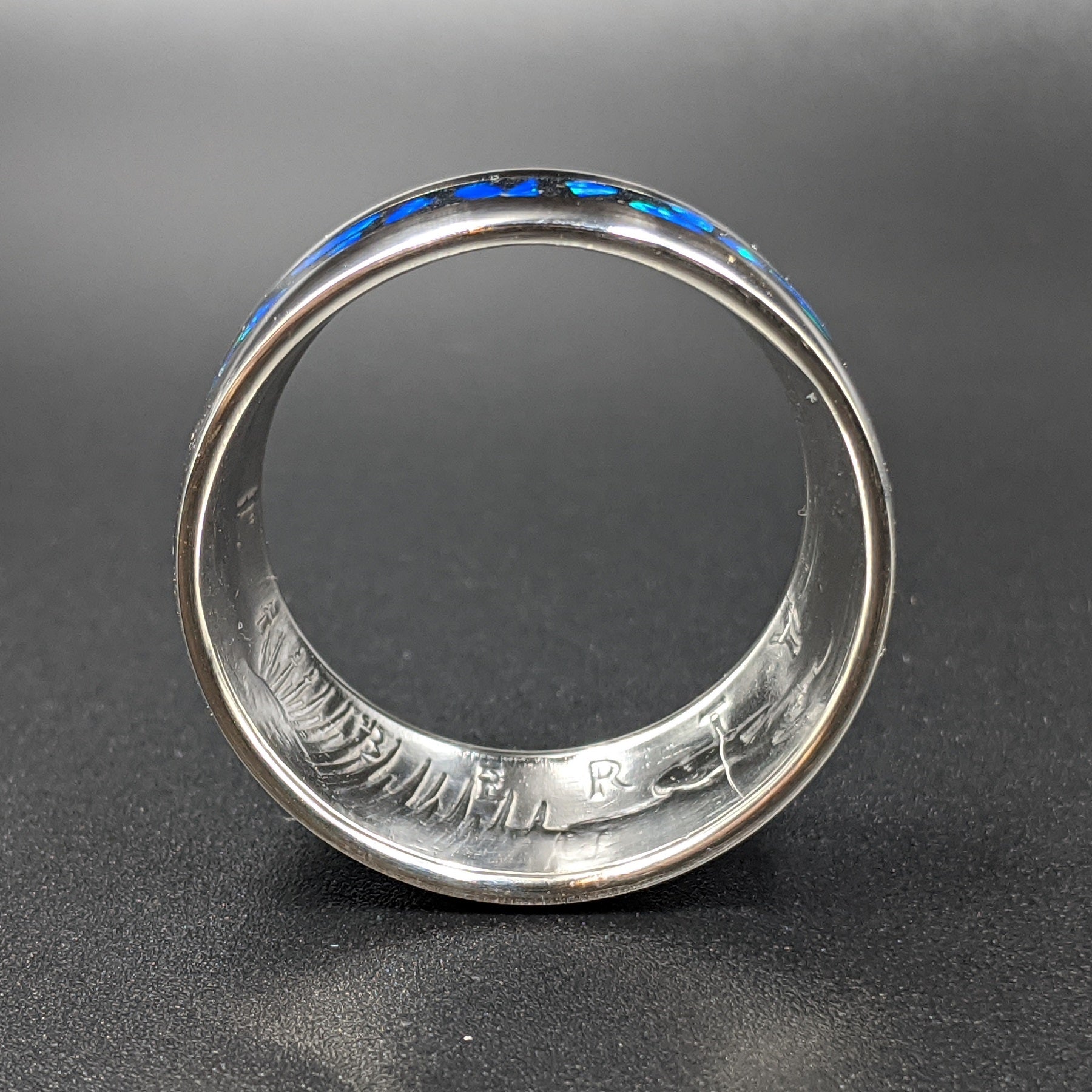 face view of a cremation ash coin ring