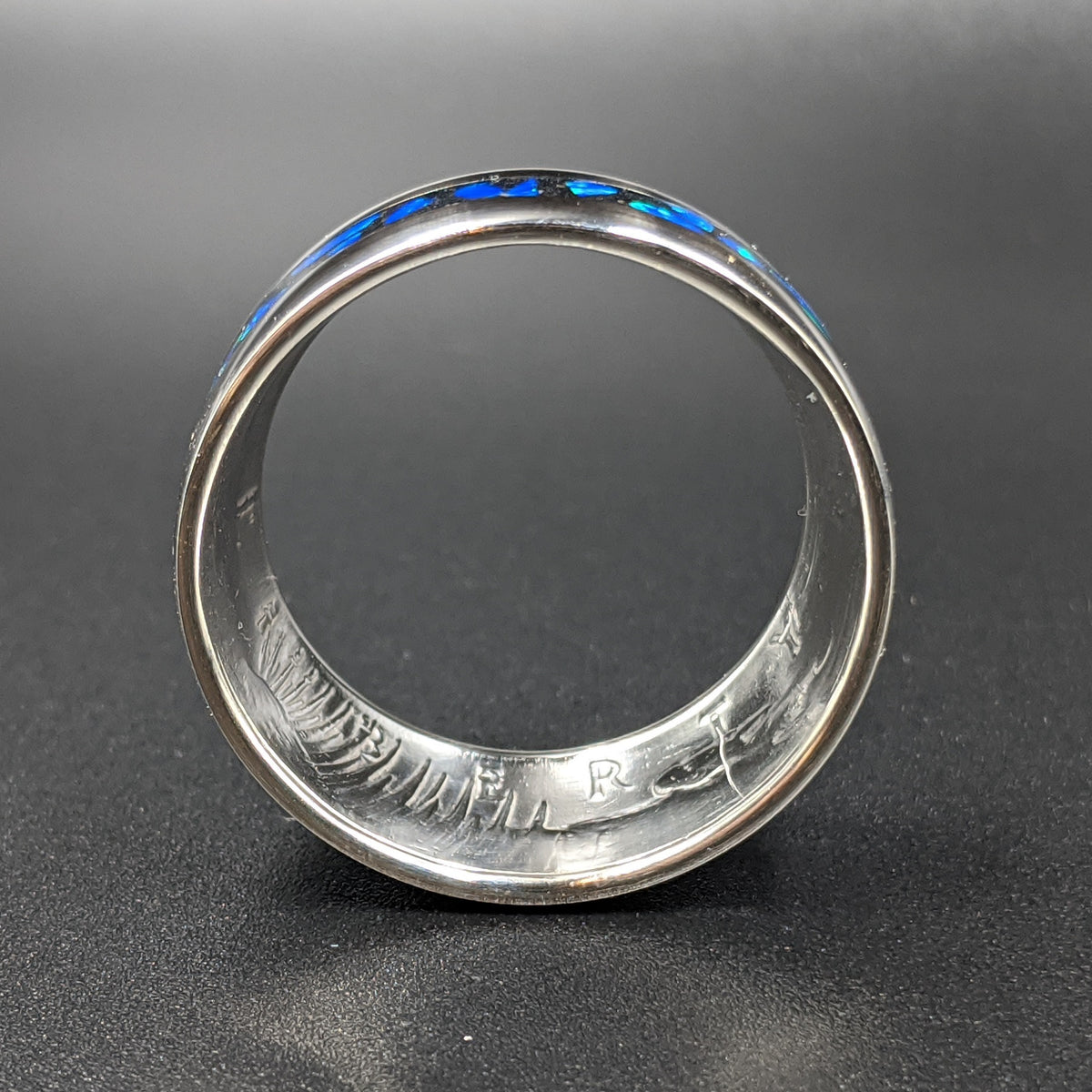 face view of a cremation ash coin ring