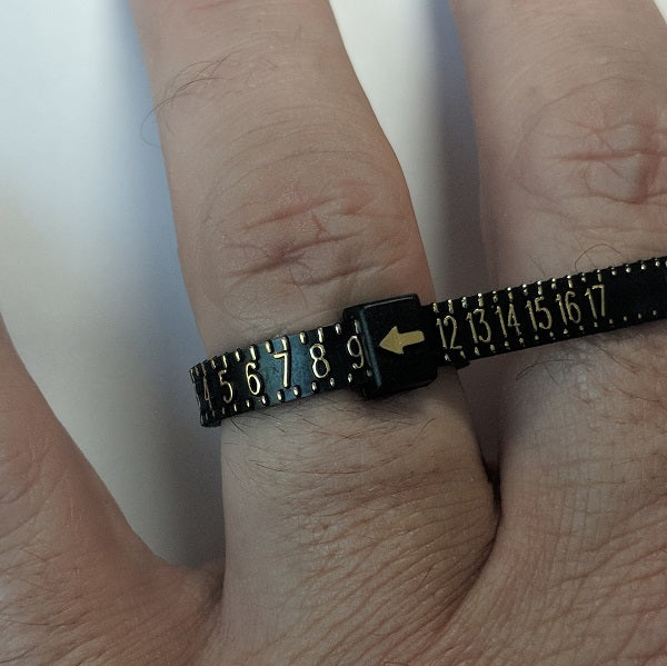 Multisizer Ring Sizing Gauge measuring a ring finger - Silver State Foundry