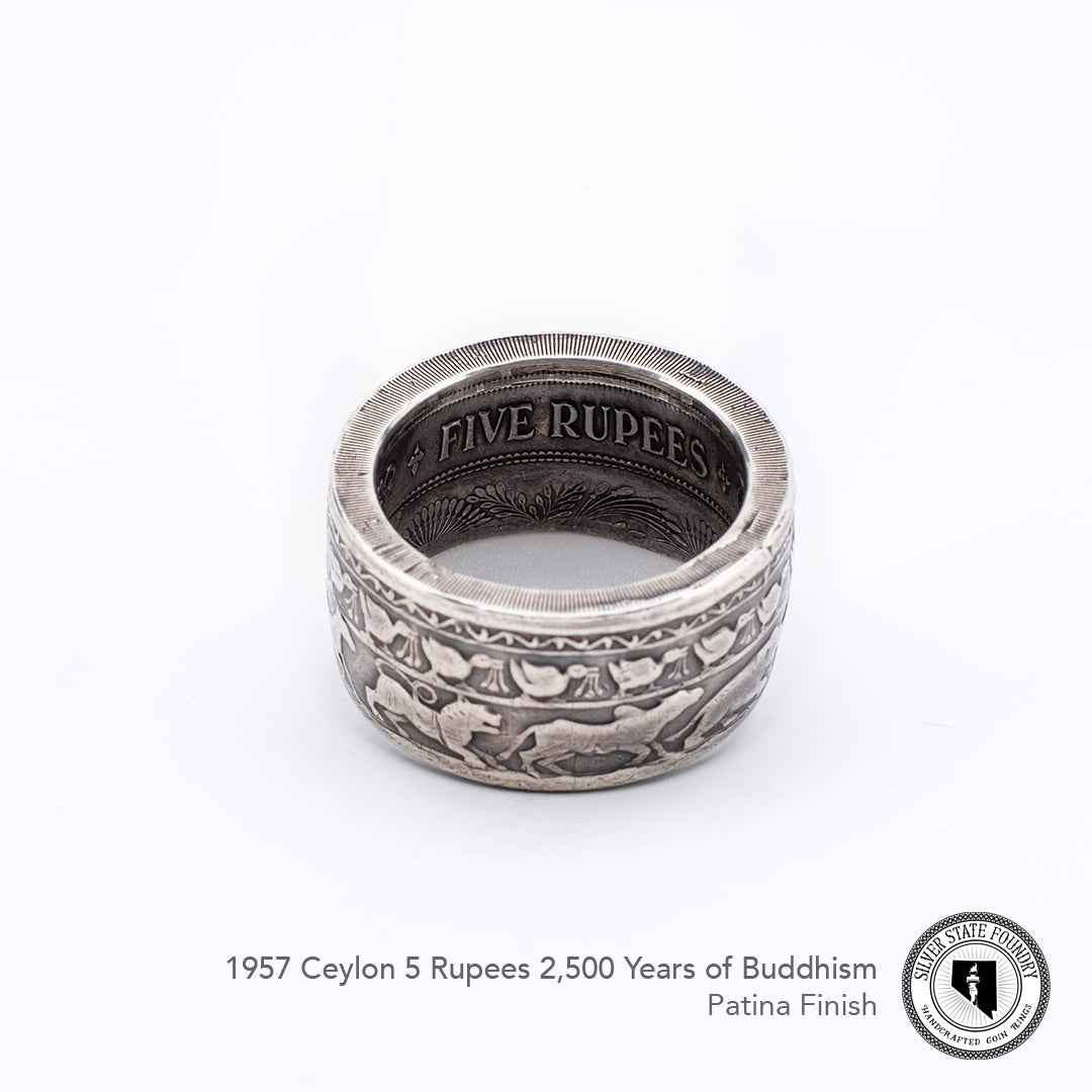 Reeds intact on this buddhism celebration coin ring.