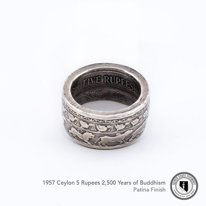 Reeds intact on this buddhism celebration coin ring.